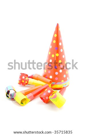  balloons-on-the-icing-and-party-hats-on-a-table-at-a-birthday-party.html 