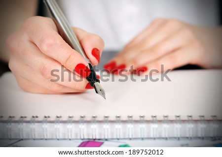 fountain pen writing on a blank diary