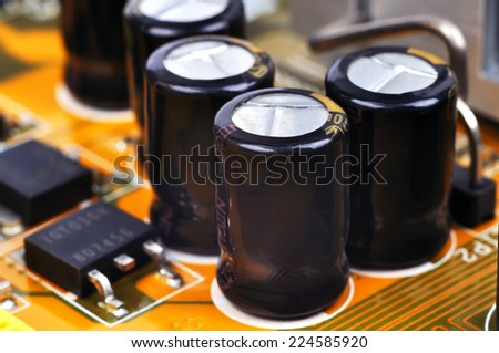 Macro of black capacitors from circuit board