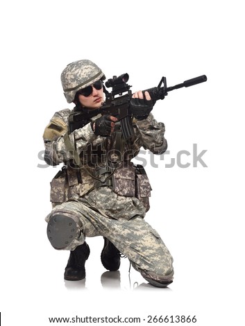 American soldier kneeling with rifle