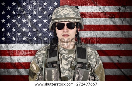 american soldier and USA flag on background