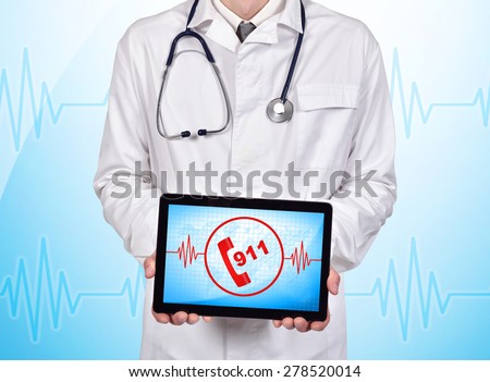 doctor holding touch pad with 911 symbol on a blue background