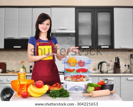 happy woman chef  showing cooked dish