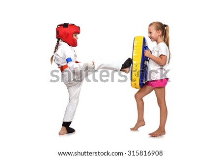 karate girl It fulfills kicks  on a white background