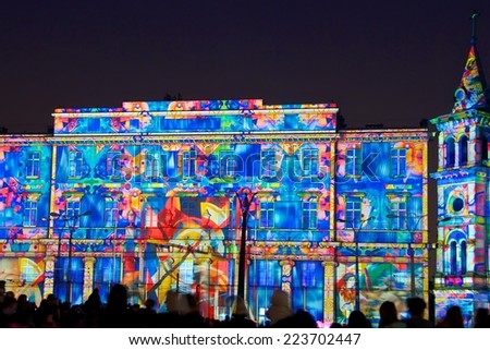 LODZ, POLAND - SEPTEMBER 11: Illuminations of buildings in the city, at Light Move Festival on September 11, 2014 in Lodz, Plac Wolnosci.