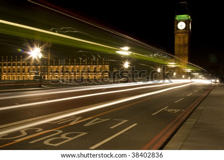 Big Ben at Night with Traffic in Bus Lane, London, England