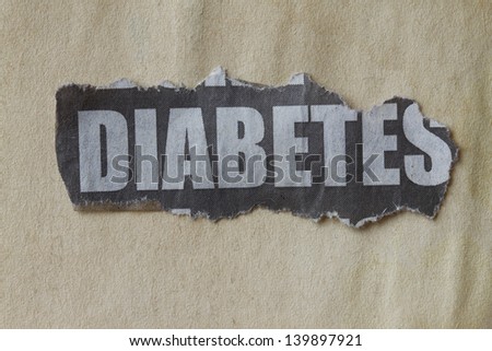 macro picture of newspaper cutout with word diabetes