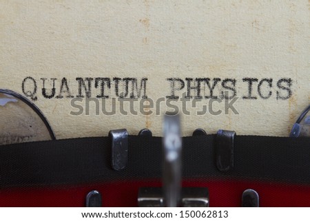Quantum physics type written in a vintage paper.