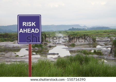 Risk ahead signage on a lahar area.
