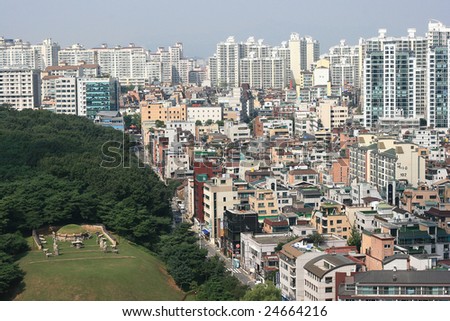 http://image.shutterstock.com/display_pic_with_logo/98636/98636,1234101796,3/stock-photo-gangnam-district-in-korea-with-a-royal-tomb-24664216.jpg