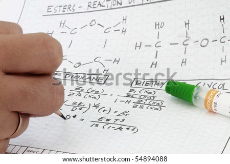 Chemistry Formula writing in engineering notes with chemical reactions.