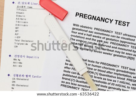 Pregnancy test device over a pregnancy test instruction - many uses in the medical industry