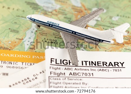 Travel concept to middle east - with flight itinerary, boarding pass and baggage claim