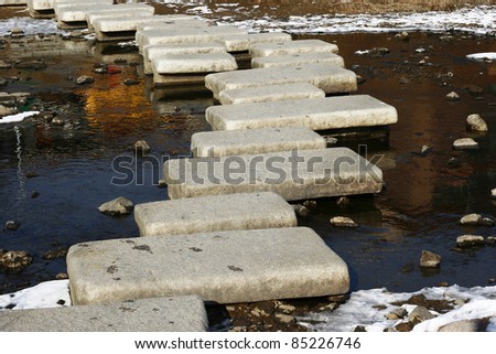 Crossing the river - slab of stone arrange to cross the river.