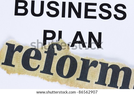 Reform of business plan abstract - reform cutout lain on business plan concept.