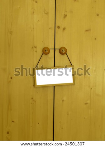 closing door with a blank tag for a note