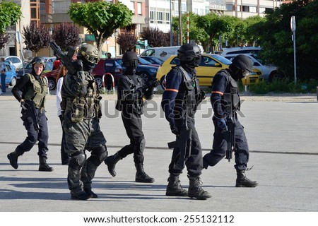 Club of stuntmen shows to people of the city a simulation of training of police special forces in Vilagarcia de Arousa, Galicia, Spain. June 16, 2014.