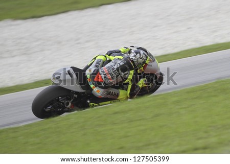 SEPANG MALAYSIA-FEB 7 Italy No 46 Valentino Rossi of Yamaha Factory Racing at MotoGP Official Test Sepang 1 on Feb 7 2013 in Sepang Malaysia Season 2013 will start in Qatar on April 7 SEPANG MALAYSIA-FEB 7 Italy No 46 Valentino Rossi of Yamaha Factory Racing at MotoGP Official Test Sepang 1 on Feb 7 2013 in Sepang Malaysia Season 2013 will start in Qatar on April 7