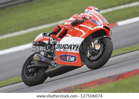 SEPANG MALAYSIA-FEB 7 Italy No 4 Andrea Dovizioso of Ducati Team at MotoGP Official Test Sepang 1 on Feb 7 2013 in Sepang Malaysia Season 2013 will start in Qatar on April 7 SEPANG MALAYSIA-FEB 7 Italy No 4 Andrea Dovizioso of Ducati Team at MotoGP Official Test Sepang 1 on Feb 7 2013 in Sepang Malaysia Season 2013 will start in Qatar on April 7