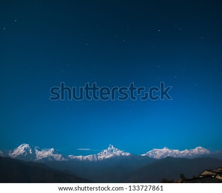 Annapurna range with Fishtail Mountain (Machapuchare Mountain - 6997m) in the middle with other Annapurna Mountains on the left and right from Dhampus Gurung Cottage (1670m or 6680ft from sea level).