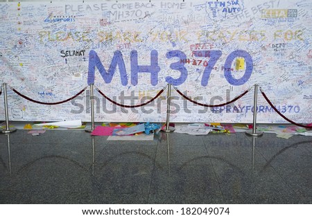 KUALA LUMPUR INTERNATIONAL AIRPORT - MARCH 17, 2014: Support messages and prayers for Malaysia Airlines Boeing 777-200ER MH370 in KLIA, Sepang, Malaysia. The airplane disappeared since March 8.