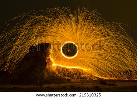 Long exposure burning and spinning of steel wool