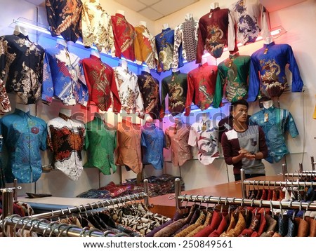 JAKARTA, INDONESIA - SEPT 13, 2014 : Rows of colorful batik pattern on sale in Jakarta, Indonesia.