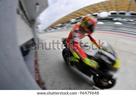 SEPANG, MALAYSIA-MARCH 1:Italian Valentino Rossi of Ducati Team at the 2nd MotoGP winter testing on Mar. 1, 2012 in Sepang, Malaysia. The 2012 MotoGP season starts on April 8 in Qatar.
