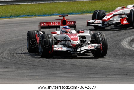 Anthony Davidson defending his position against team mate Takuma Sato at turn Two at Sepang F1 Malaysia 2007 Grand Prix
