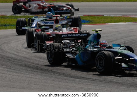Formula One cars racing at F1 PETRONAS Grand Prix Sepang Malaysia 2007