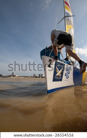 KUALA TERENGGANU, MALAYSIA - DEC 4 : Low angle shot of Team Sebastian Col of French Team/K Challenge in action at Monsoon Cup 2008 in K. Terengganu, Malaysia on December 4, 2008. They finished sixth.