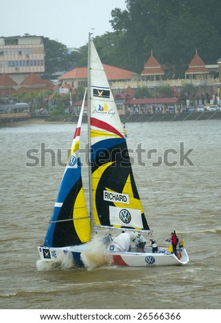 KUALA TERENGGANU, MALAYSIA - DEC 6 : Team Richard sails back to jetty in stormy weather at Monsoon Cup 2008 in K. Terengganu, Malaysia on December 6, 2008. Williams finished eight.