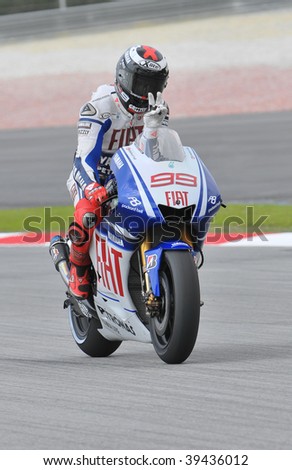 SEPANG, MALAYSIA - OCT 23 : Spanish Jorge Lorenzo of Fiat Yamaha Team in action at a testing session during Shell Advance Malaysian Motorcycle Grand Prix held October 23, 2009 in Sepang, Malaysia.