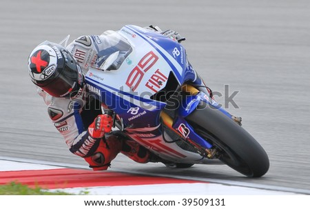 SEPANG, MALAYSIA - OCT 24 : Spanish Jorge Lorenzo of Fiat Yamaha Team takes a corner during qualifying session at Shell Advance Malaysian Motorcycle Grand Prix on October 24, 2009 in Sepang.
