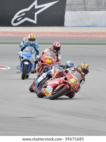 SEPANG, MALAYSIA - OCT 25 : 250cc riders in action during race day at Shell Advance Malaysian Motorcycle Grand Prix on October 25, 2009 in Sepang. Hiroshi Aoyama won the 250cc class race.