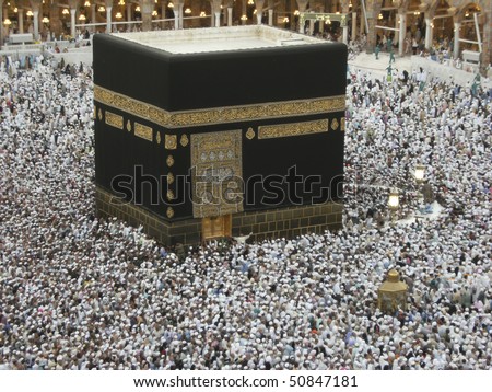 MECCA - JAN 2 : Close up view of Muslim pilgrims circumambulate the kaaba at Haram Mosque Jan 2, 2008 in Mecca. Millions of muslims around the world come for hajj during this time.