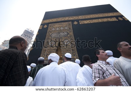 MAKKAH - APRIL 26 : Close up of kaaba with pilgrims circumambulate the Kaaba at Masjidil Haram on April 26, 2010 in Makkah, Saudi Arabia. Muslims all around the world face the Kaaba during prayer time