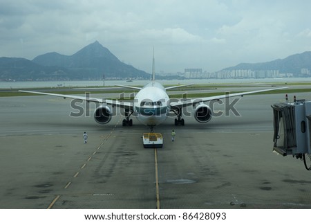 HONG KONG-AUG 24:Airbus A330-300 Cathay Pacific being towed at Hong Kong International Airport in Hong Kong August 24, 2007. The airline is the world\'s 3rd largest airline by market capitalization