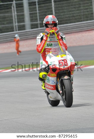 SEPANG,MALAYSIA-OCT 25:Italian Marco Simoncelli of Metis Gilera at 250cc Shell Advance Malaysian MotoGP on October 25, 2009 in Sepang.Simoncelli died at accident in the Motogp race on Oct. 23, 2011