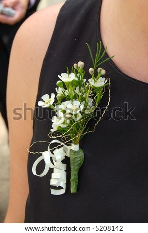 Female Floral wedding buttonhole boutonniere