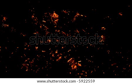 Embers on black. Abstract background.