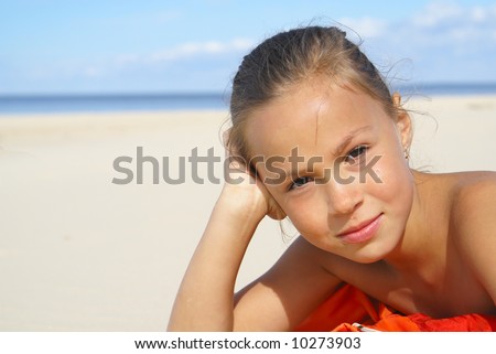 stock photo Preteen girl on a beach