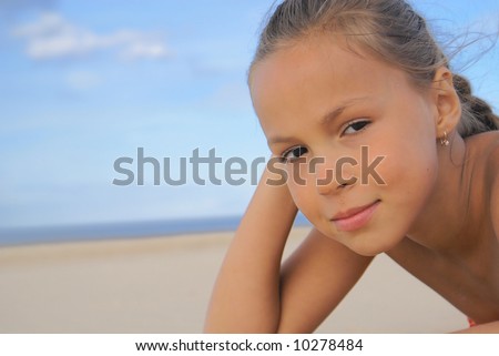 stock photo Preteen girl on a beach