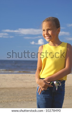 stock photo Preteen girl on a beach