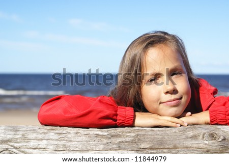 stock photo Preteen girl on a beach