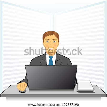 young happy man in business office with laptop