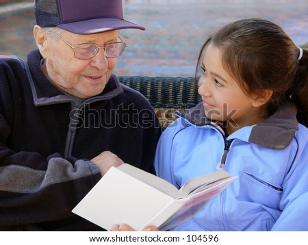 Grandfather reading a book