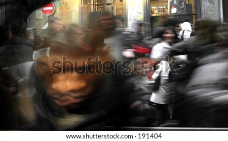 Artistic blur of a crowd running on the street of Paris