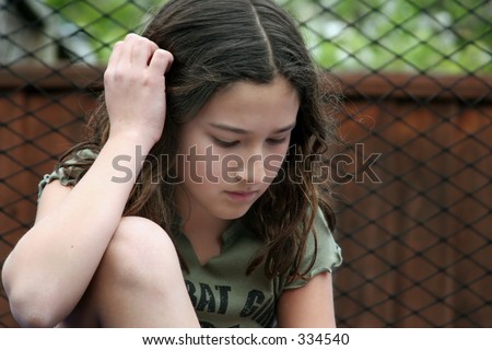 Girl thinking outdoors
