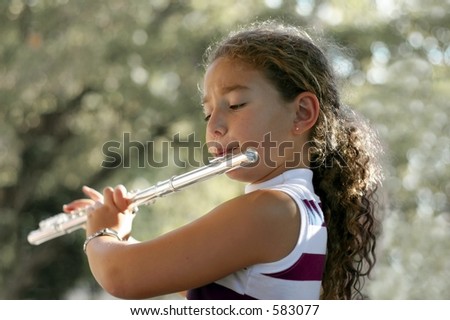 Girl playing a flute